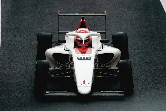 Andrei in the white-and-red Italian F4 car
